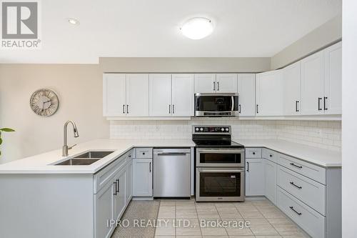 29 Maude Lane, Guelph (Grange Hill East), ON - Indoor Photo Showing Kitchen With Stainless Steel Kitchen With Double Sink