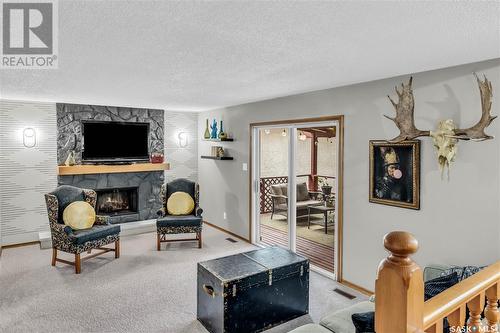 4308 Pasqua Street, Regina, SK - Indoor Photo Showing Living Room With Fireplace