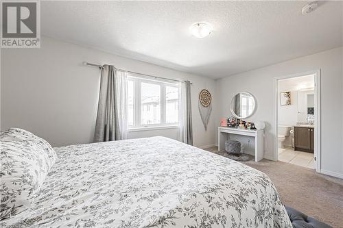 11 Mcwatters Street, Binbrook, ON - Indoor Photo Showing Bedroom