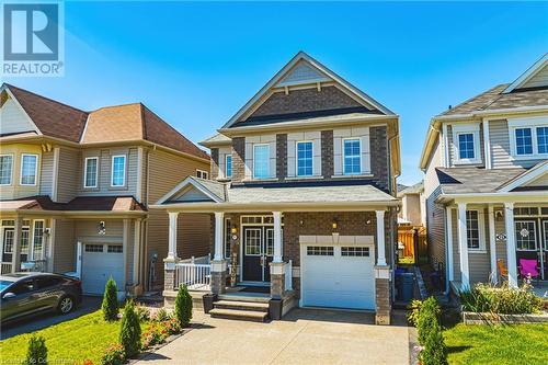 11 Mcwatters Street, Binbrook, ON - Outdoor With Deck Patio Veranda With Facade