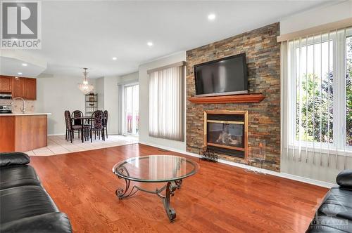 152 Flamborough Walk, Kanata, ON - Indoor Photo Showing Living Room With Fireplace