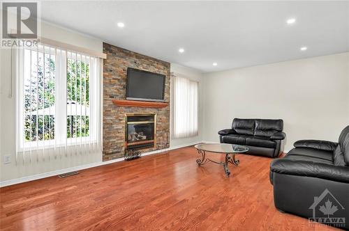 152 Flamborough Walk, Kanata, ON - Indoor Photo Showing Living Room With Fireplace