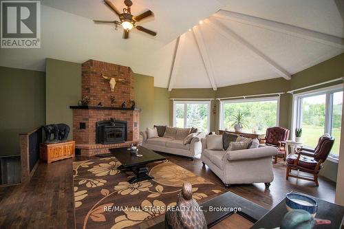 69 County Rd 121, Kawartha Lakes (Fenelon Falls), ON - Indoor Photo Showing Living Room With Fireplace