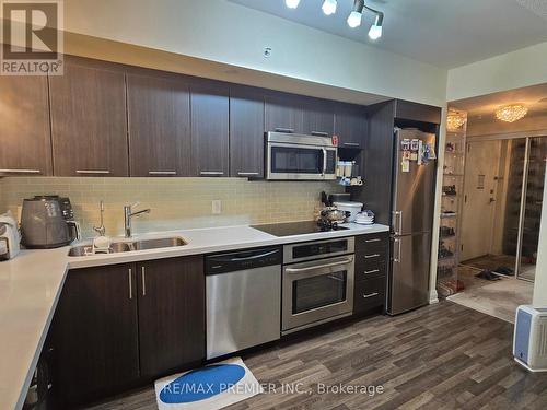 709 W - 565 Wilson Avenue, Toronto (Clanton Park), ON - Indoor Photo Showing Kitchen With Stainless Steel Kitchen With Double Sink