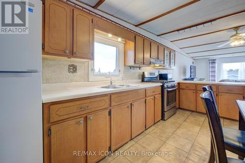 25 Grand Vista Crescent, Wellington North, ON - Indoor Photo Showing Kitchen With Double Sink