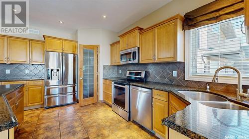 4022 Cumberland Road E, Regina, SK - Indoor Photo Showing Kitchen With Double Sink