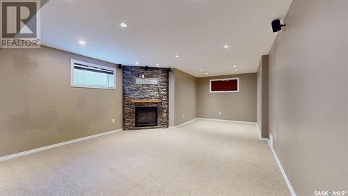 4022 Cumberland Road E, Regina, SK - Indoor With Fireplace