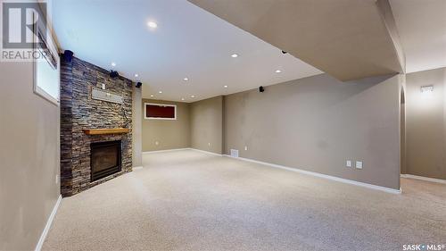 4022 Cumberland Road E, Regina, SK - Indoor Photo Showing Other Room With Fireplace