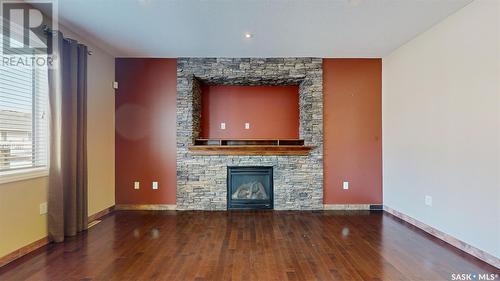 4022 Cumberland Road E, Regina, SK - Indoor Photo Showing Other Room With Fireplace