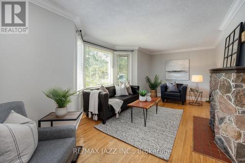 59 Harmony Road N, Oshawa (Eastdale), ON - Indoor Photo Showing Living Room With Fireplace