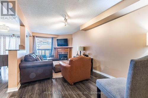 17 Coppermill Drive, Brampton (Northwest Sandalwood Parkway), ON - Indoor Photo Showing Living Room With Fireplace