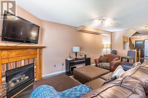 17 Coppermill Drive, Brampton, ON - Indoor Photo Showing Living Room With Fireplace