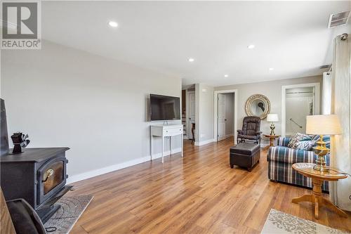 317 Des Roches Road, Bouctouche Bay, NB - Indoor Photo Showing Living Room With Fireplace