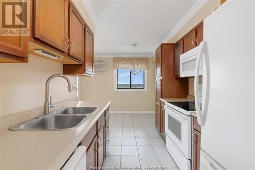 150 Park Street West Unit# 1516, Windsor, ON - Indoor Photo Showing Kitchen With Double Sink