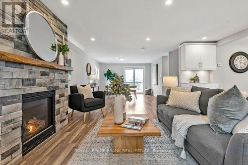 117 Elm Tree Road, Kawartha Lakes (Little Britain), ON - Indoor Photo Showing Living Room With Fireplace