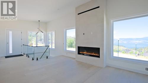 402 Trestle Ridge Drive, Kelowna, BC - Indoor With Fireplace