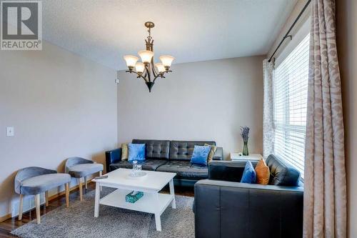 205 Coral Springs Close Ne, Calgary, AB - Indoor Photo Showing Living Room