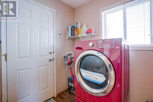 205 Coral Springs Close Ne, Calgary, AB - Indoor Photo Showing Laundry Room