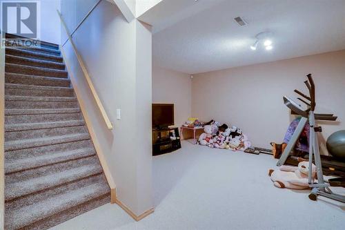 205 Coral Springs Close Ne, Calgary, AB - Indoor Photo Showing Gym Room