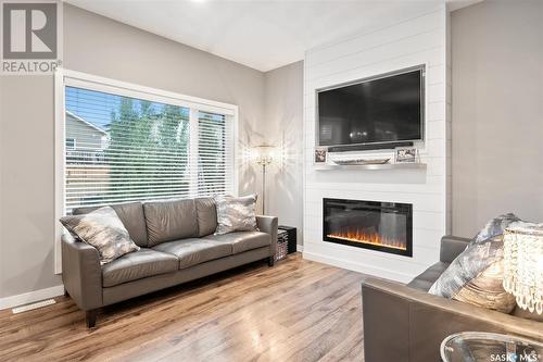 164 Newton Way, Saskatoon, SK - Indoor Photo Showing Living Room With Fireplace