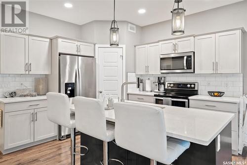 164 Newton Way, Saskatoon, SK - Indoor Photo Showing Kitchen With Stainless Steel Kitchen With Upgraded Kitchen