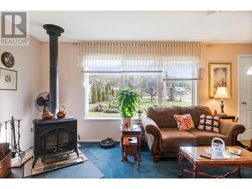 7024 Highway 97-B Highway, Salmon Arm, BC - Indoor Photo Showing Living Room With Fireplace