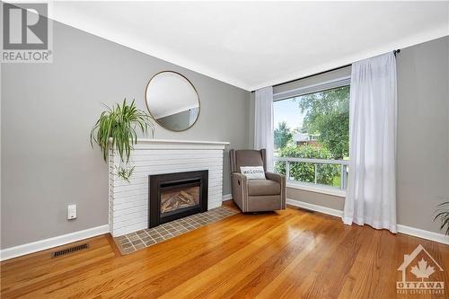 1142 Sherman Drive, Ottawa, ON - Indoor Photo Showing Living Room With Fireplace