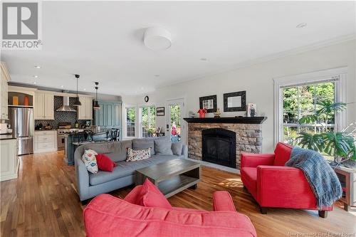 51 Maurice Street, Dieppe, NB - Indoor Photo Showing Living Room With Fireplace