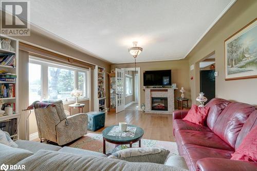 6949 Thorold Stone Road, Niagara Falls, ON - Indoor Photo Showing Living Room With Fireplace