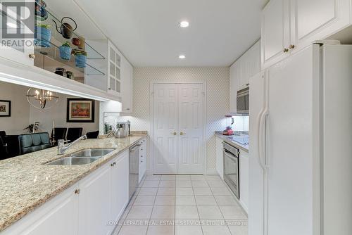 203 - 10 Old Mill Trail, Toronto, ON - Indoor Photo Showing Kitchen With Double Sink