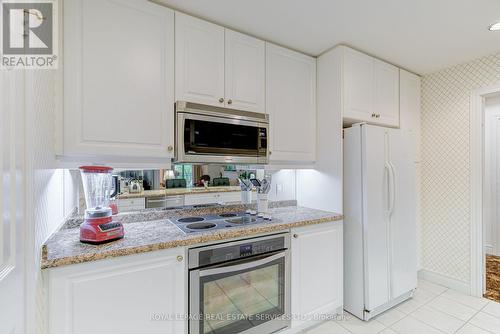 203 - 10 Old Mill Trail, Toronto, ON - Indoor Photo Showing Kitchen