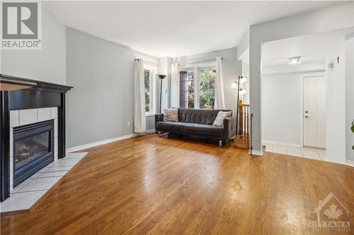 94 Trump Avenue, Ottawa, ON - Indoor Photo Showing Living Room With Fireplace