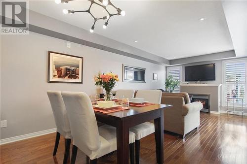 145 Patriot Place, Ottawa, ON - Indoor Photo Showing Dining Room With Fireplace