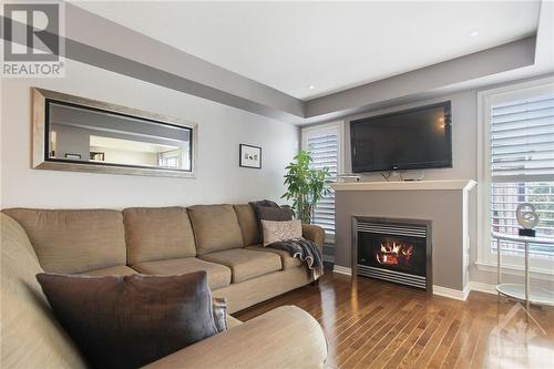 145 Patriot Place, Ottawa, ON - Indoor Photo Showing Living Room With Fireplace