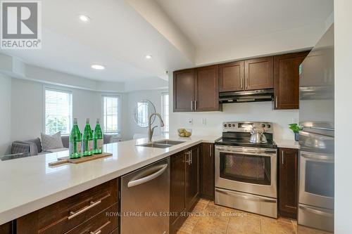 12 - 2614 Dashwood Drive, Oakville (West Oak Trails), ON - Indoor Photo Showing Kitchen With Stainless Steel Kitchen With Double Sink