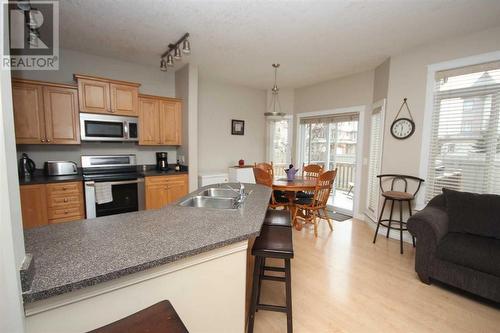 Open Concept Main Floor - 28, 411 Williams Drive, Fort Mcmurray, AB - Indoor Photo Showing Kitchen With Double Sink