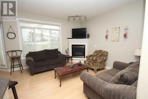 Living Room - 28, 411 Williams Drive, Fort Mcmurray, AB - Indoor Photo Showing Living Room With Fireplace