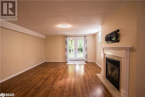 59 Livingstone Street E, Barrie, ON - Indoor Photo Showing Living Room With Fireplace