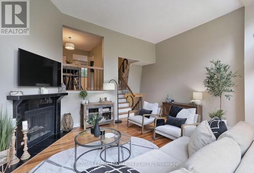 52 - 4165 Fieldgate Drive, Mississauga, ON - Indoor Photo Showing Living Room With Fireplace