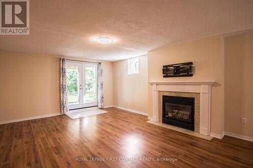 59 Livingstone Street E, Barrie (East Bayfield), ON - Indoor Photo Showing Living Room With Fireplace