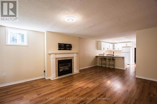 59 Livingstone Street E, Barrie (East Bayfield), ON - Indoor Photo Showing Living Room With Fireplace