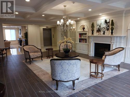 101 - 2300 Upper Middle Road, Oakville (Glen Abbey), ON - Indoor Photo Showing Other Room With Fireplace