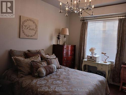 101 - 2300 Upper Middle Road, Oakville (Glen Abbey), ON - Indoor Photo Showing Bedroom