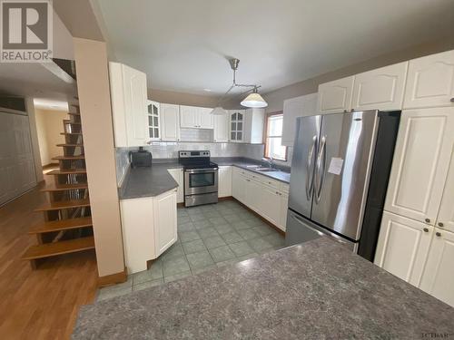 59 Mckelvie Ave, Kirkland Lake, ON - Indoor Photo Showing Kitchen With Double Sink