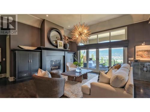 1749 Capistrano Drive, Kelowna, BC - Indoor Photo Showing Living Room With Fireplace