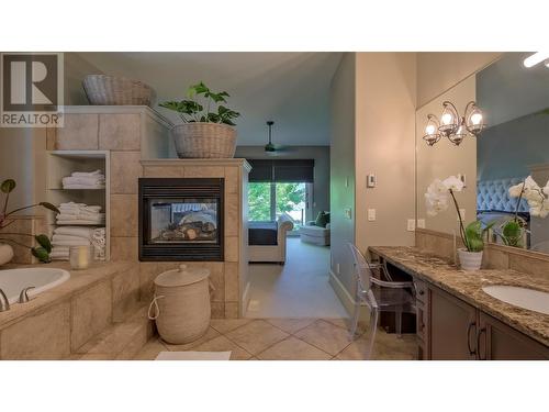 1749 Capistrano Drive, Kelowna, BC - Indoor Photo Showing Bathroom With Fireplace