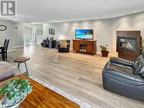 6 - 179 Herchimer Avenue, Belleville, ON - Indoor Photo Showing Living Room With Fireplace