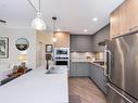 104-960 Reunion Ave, Langford, BC  - Indoor Photo Showing Kitchen With Stainless Steel Kitchen With Double Sink With Upgraded Kitchen 