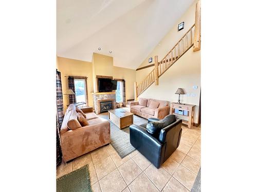 G5-D - 1351 Gerry Sorensen Way, Kimberley, BC - Indoor Photo Showing Living Room With Fireplace