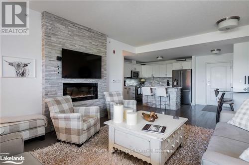 309 - 1 Chamberlain Crescent, Collingwood, ON - Indoor Photo Showing Living Room With Fireplace